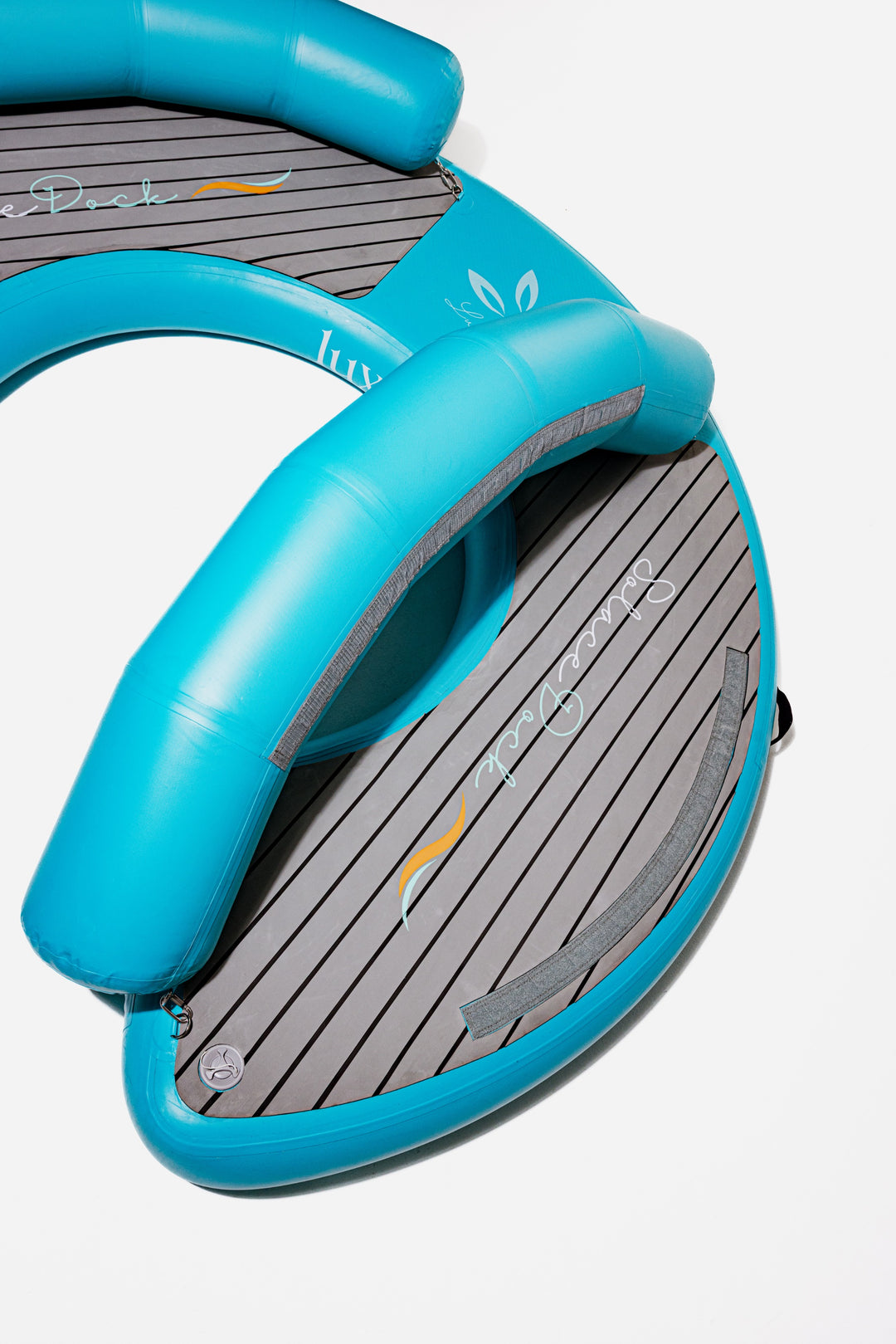 SolaceDock 270 floating in turquoise water with people relaxing