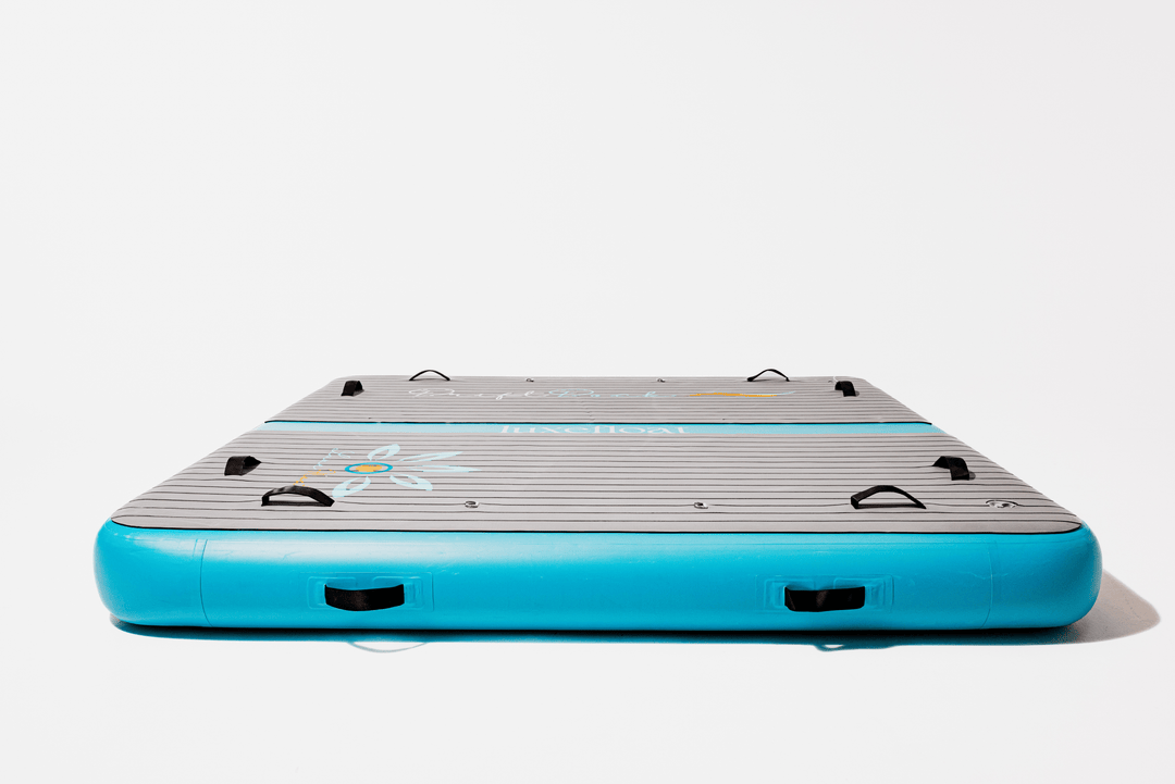 DriftDock water lounge pontoon floating behind a yacht