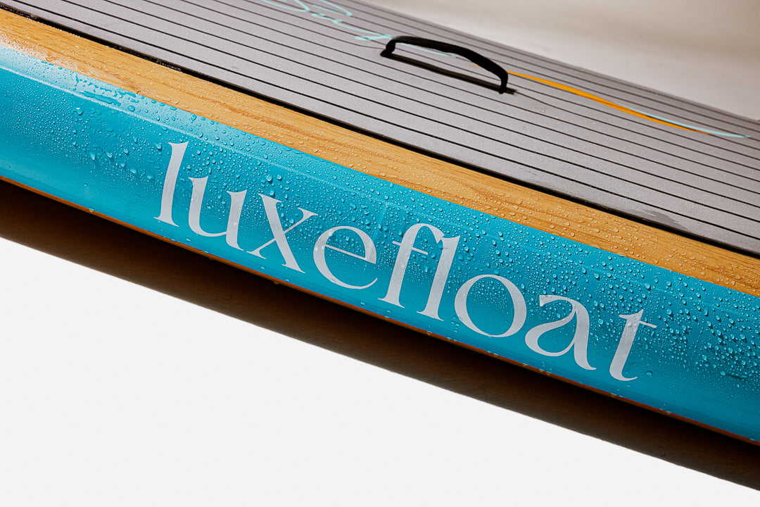 LuxeFloat SUP with floral-inspired branding and sleek design